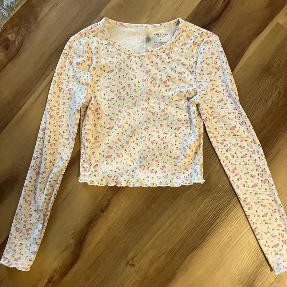 This is a long sleeve, shorter floral top, size M, brand is Arizona Jean co